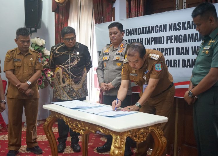Pj Bupati Merangin Teken NPHD Pemilukada 2024