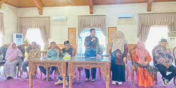 Bupati Tanjab Timur sekaligus Ketua Dewan Pakar MD KAHMI Tanjab Timur yang mengajak alumni dan kader HMI bahu membahu membantu dalam pembangunan daerah Kabupaten Tanjab Timur